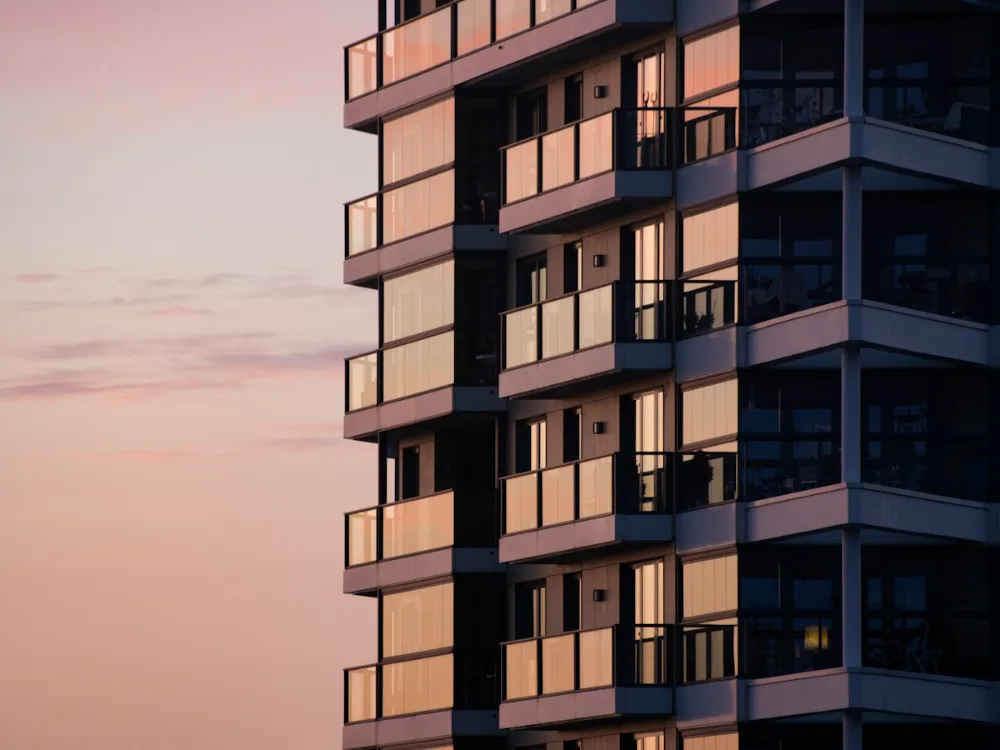 Multi-storey apartment building at dusk