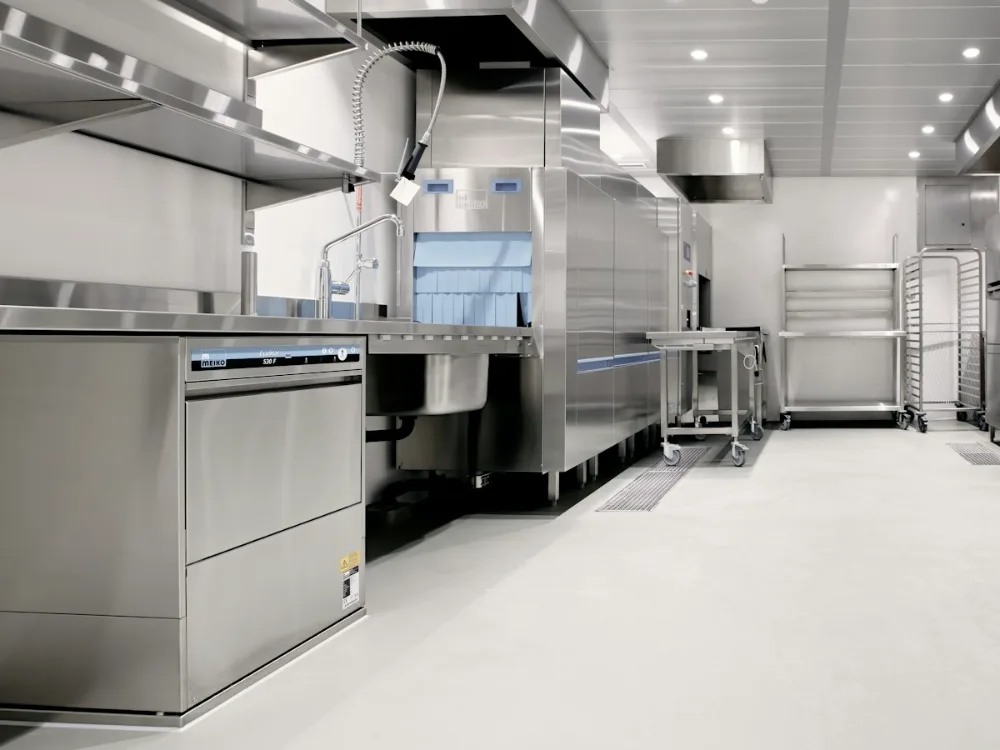 Stainless steel line in a commercial restaurant kitchen